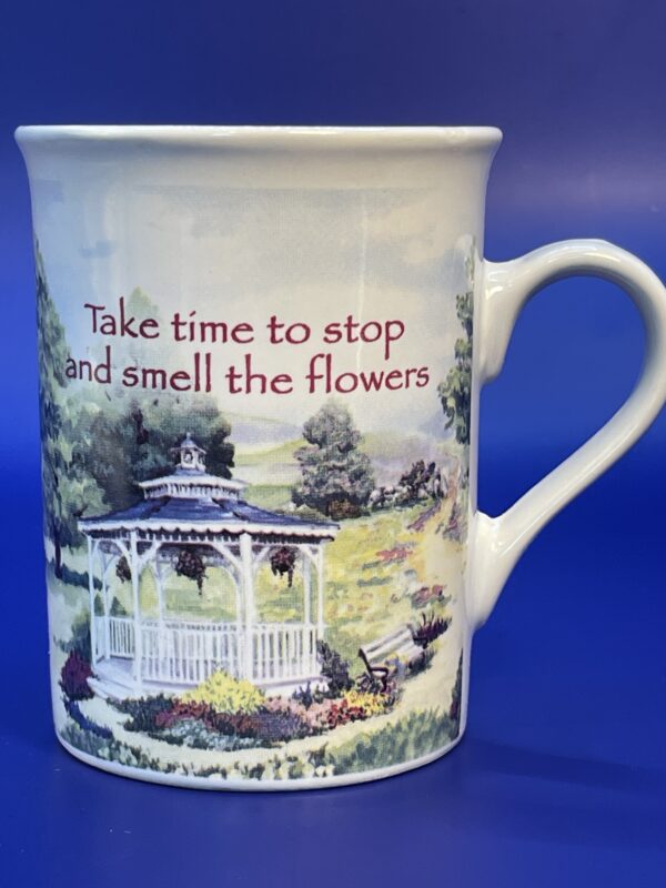 Ceramic mug with garden scene, a gazebo and Take Time And Smell The Flowers