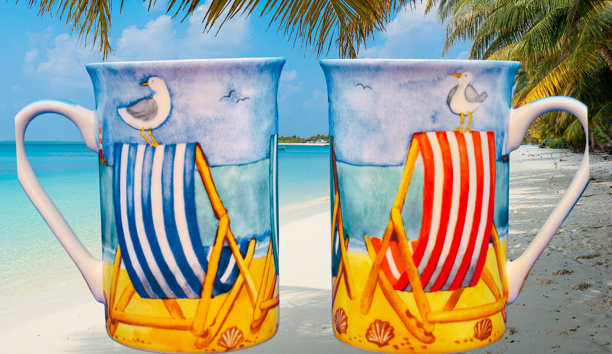 Kent Pottery Beach Chairs Mug pair displayed on tropical beach with palm trees and turquoise water