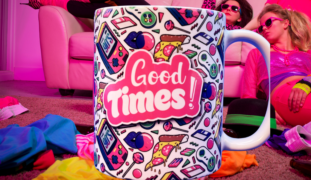 Loftipop Good Times 1990s Retro Coffee Mug lifestyle scene with pink sofa, retro sunglasses, colorful clothes, and 90s party fashion