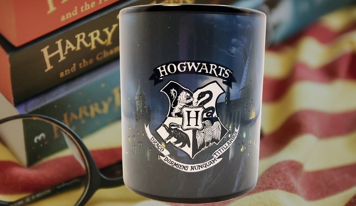 Harry Potter Hogwarts Heat Activated Mug displayed with Harry Potter books after heat activation