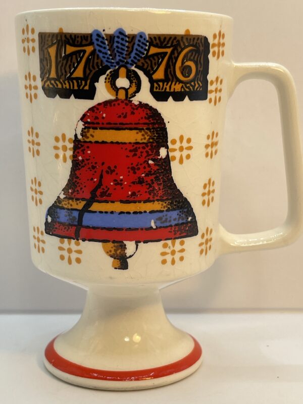 Start your morning with a reminder of freedom, the Bicentennial Liberty Bell Pedestal Mug. It's the perfect #cupofmood and toast to American history.