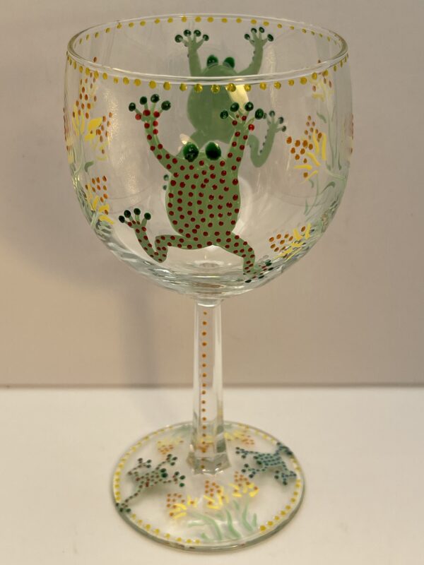 Hand painted wine glass with frogs and raised polka dots