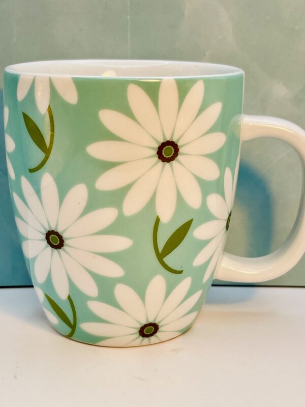 Hallmark ceramic coffee mug with daisy pattern