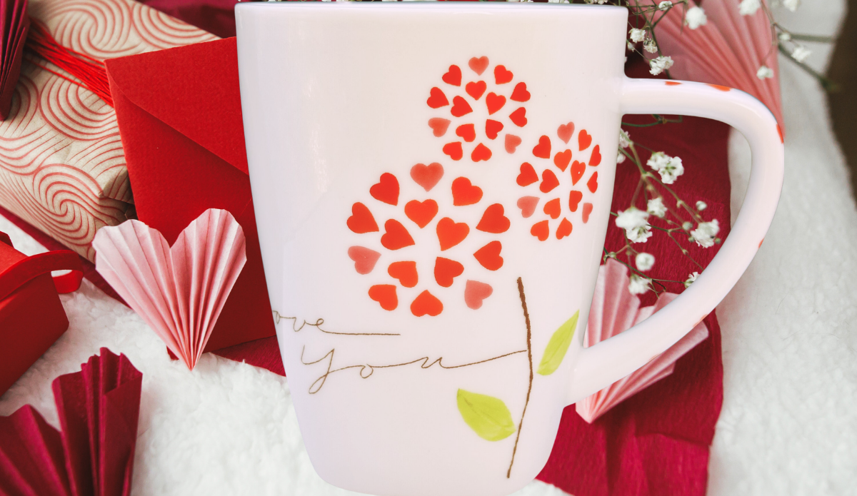 2007 I Love You Valentine Mug displayed with red envelopes, paper hearts, and romantic Valentine decor