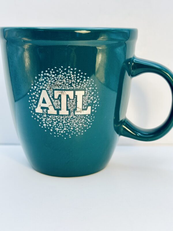 Rae Dunn ATL Souvenir Coffee Mug in deep green ceramic
