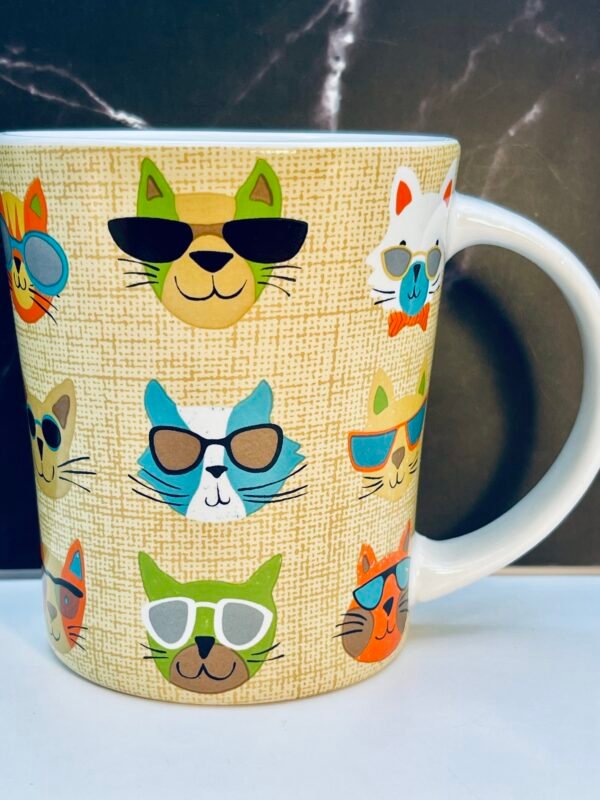 Whimsical cat coffee mug with sunglasses