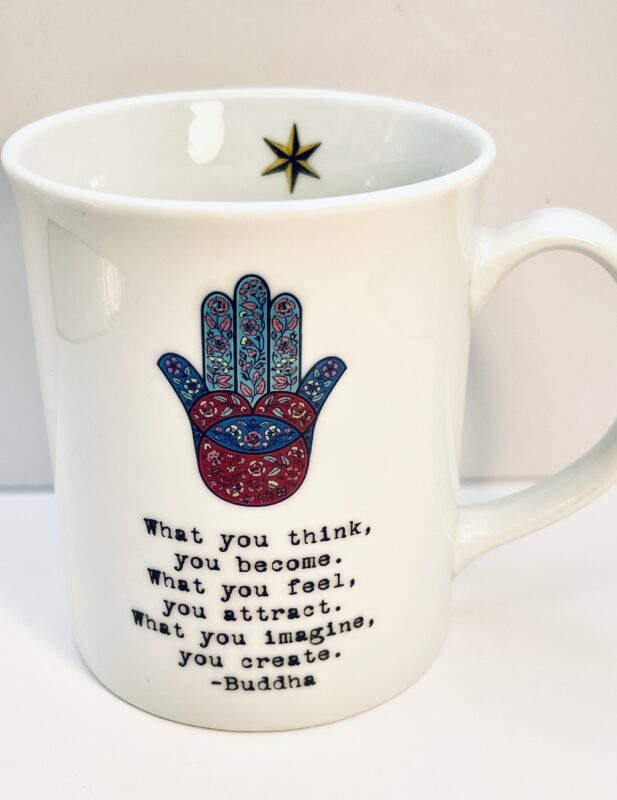 The Buddha Hamsa Hand Mug features an intricate Hamsa hand and a timeless Buddha quote. This mug is more than just drinkware. It’s a reminder that your thoughts, feelings, and imagination shape your reality.