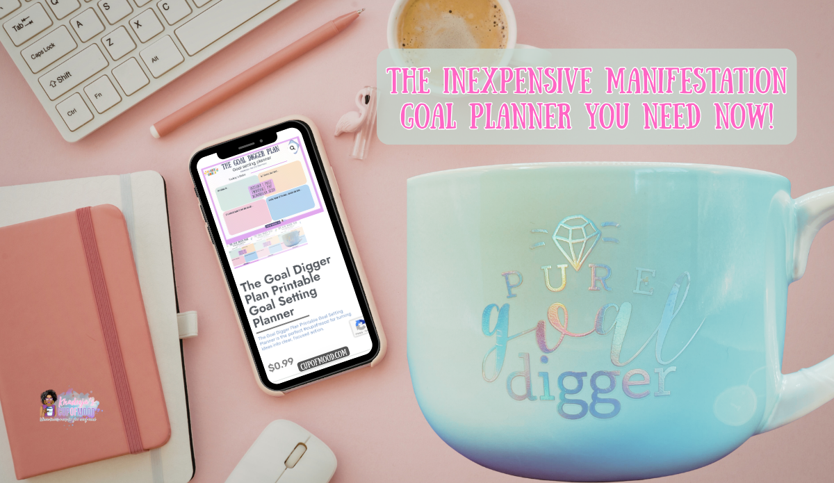 goal digger planner on phone with motivational mug for manifestation and productivity