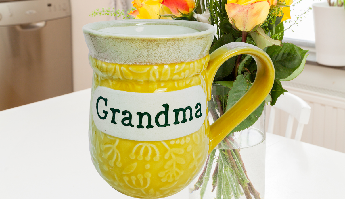 Cracker Barrel grandma mug with flowers on kitchen table