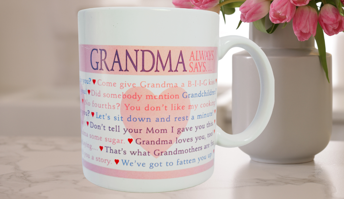 Hallmark Grandma Always Says mug styled in kitchen with flowers and soft lighting