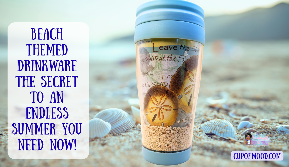 Sand and Shells travel tumbler on a sandy beach surrounded by seashells