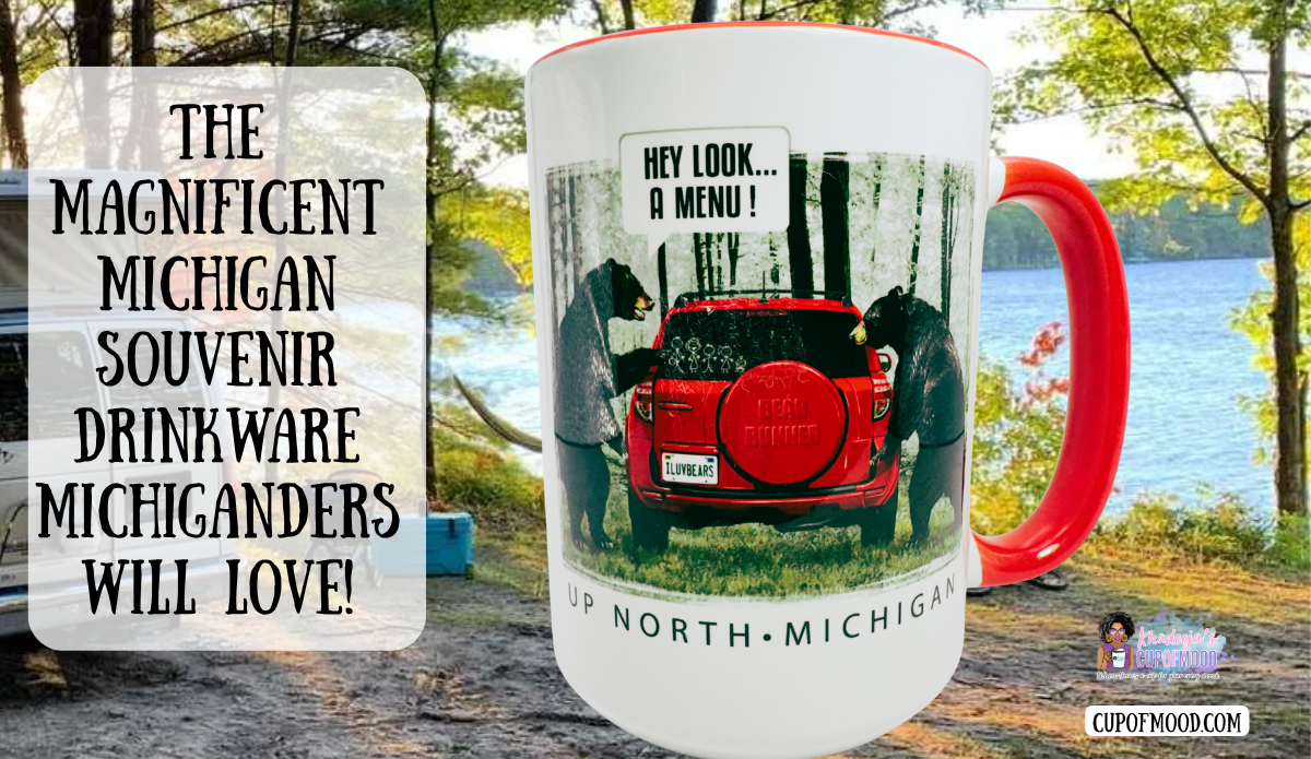 Up North Michigan black bear funny coffee mug beside a wooded lake