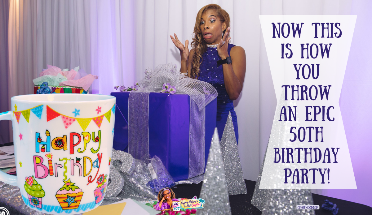 Khadeeja reacting with genuine surprise beside a large purple birthday gift, with a colorful Happy Birthday mug and silver glitter decorations.