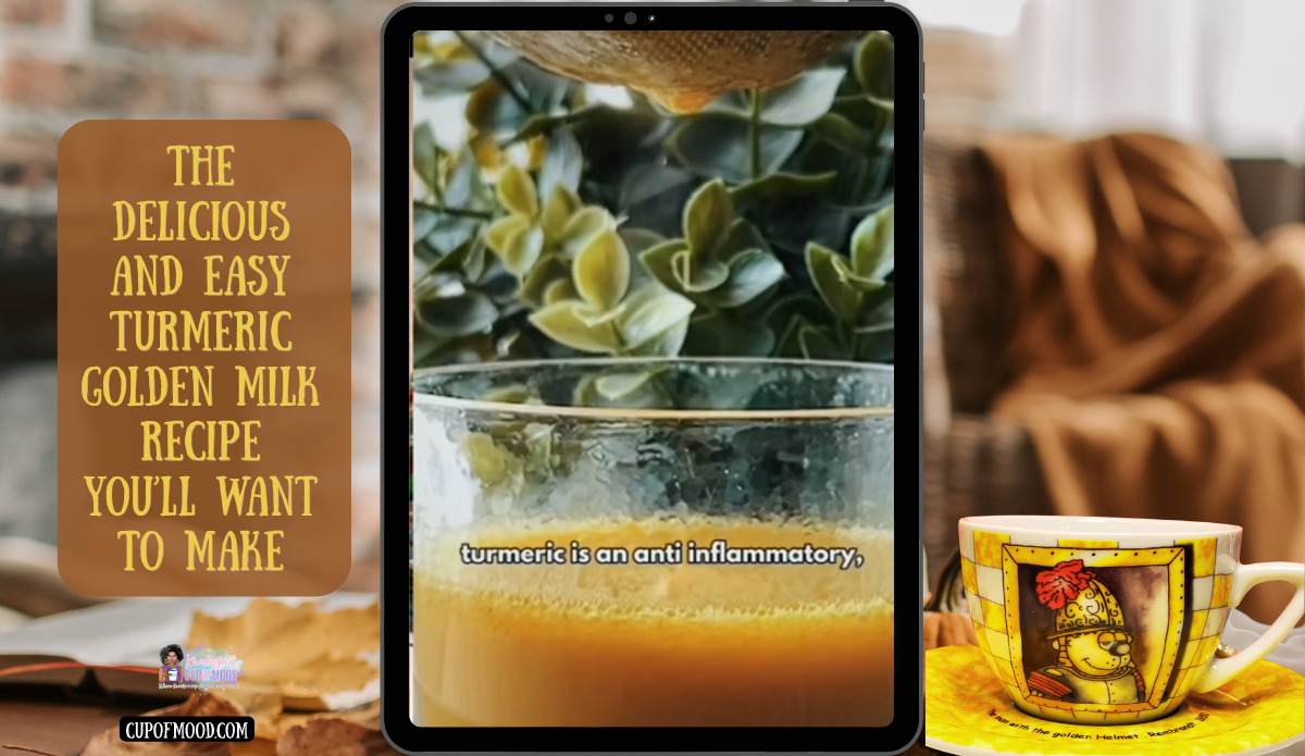 Golden turmeric milk shown on a tablet screen beside a yellow Cat With The Golden Helmet tea cup and saucer.