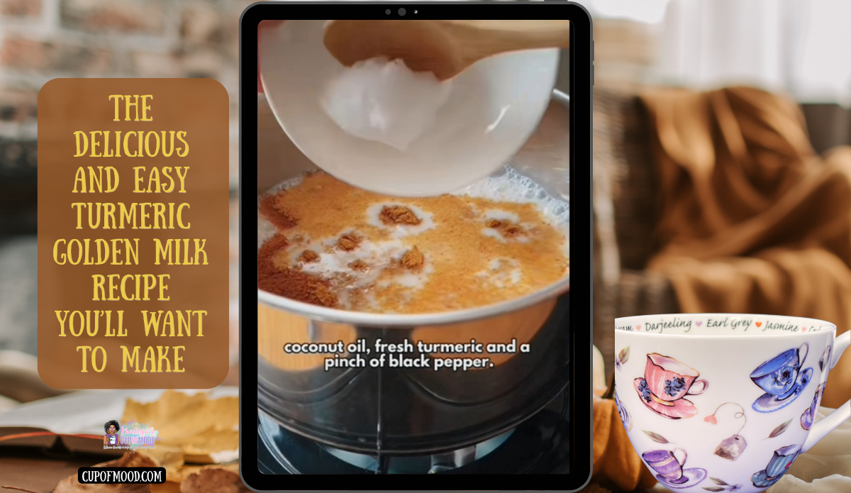 Coconut oil being added to turmeric golden milk beside a white mug decorated with colorful tea cups.