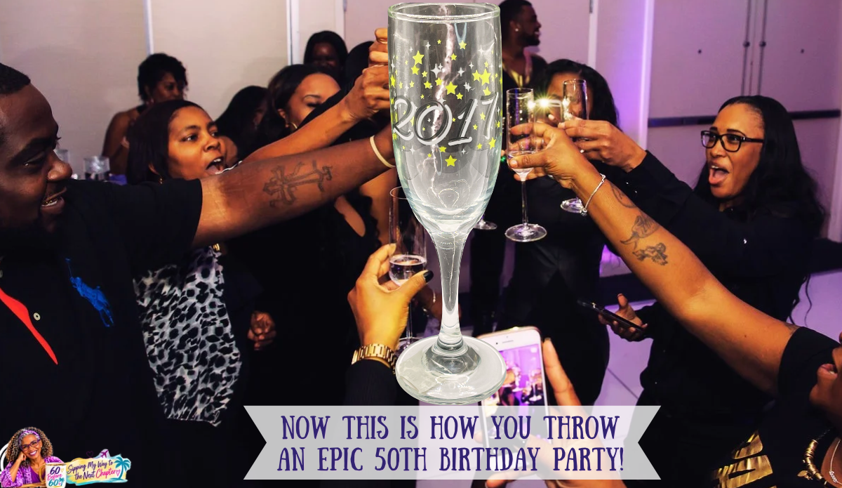 Family and friends raising champagne glasses in a group toast at Khadeeja's 50th birthday party, with a clear 2017 champagne flute decorated with yellow stars.
