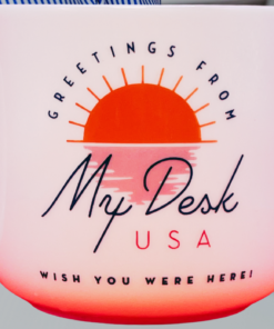 greetings from my desk mug styled on workspace with laptop and desk setup