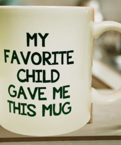 funny parent mug styled in kitchen with plants and natural lighting
