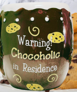 Warning Chocoholic In Residence Mug with chocolate chip cookies cozy kitchen setting