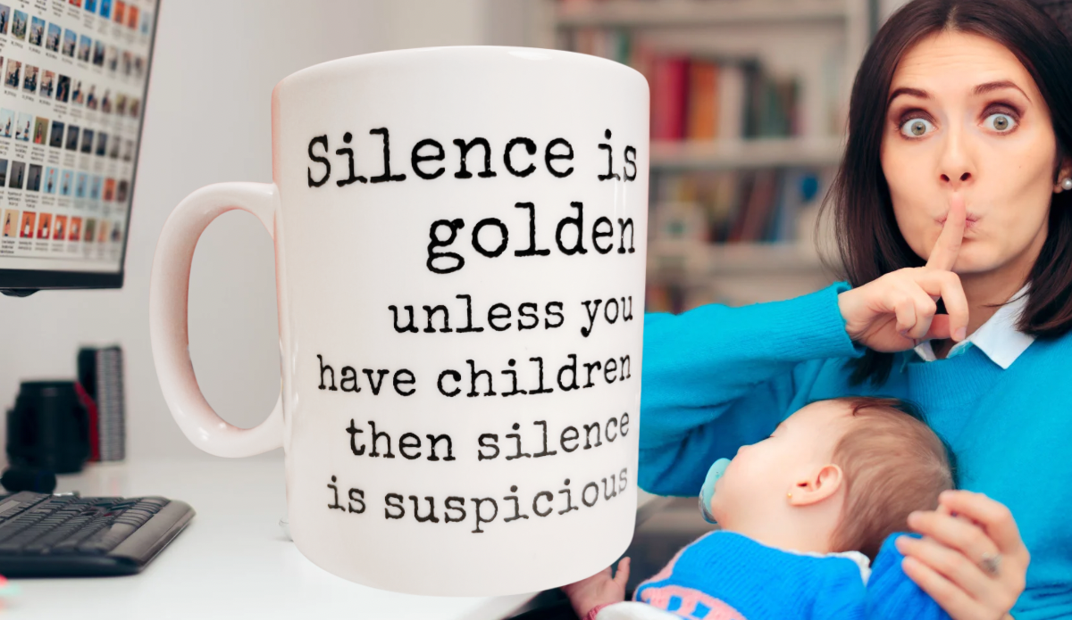 funny mom mug with silence is golden quote styled with mom holding baby and shushing gesture