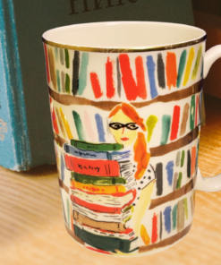 Kate Spade Library Books Mug styled on desk with books cozy reading setup