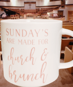 sunday church and brunch mug styled in church interior with pews and altar in background