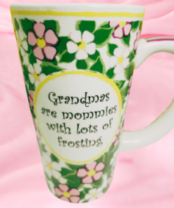 floral grandma latte mug styled on pink frosting background highlighting sweet quote theme