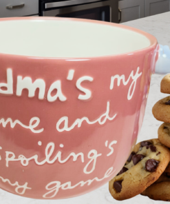 Sandra Magsamen Spoiling Grandma Pink Mug with cookies in cozy kitchen scene