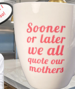 Quote Our Mothers Mug displayed in a kitchen beside a woman with a Because I said so speech bubble.