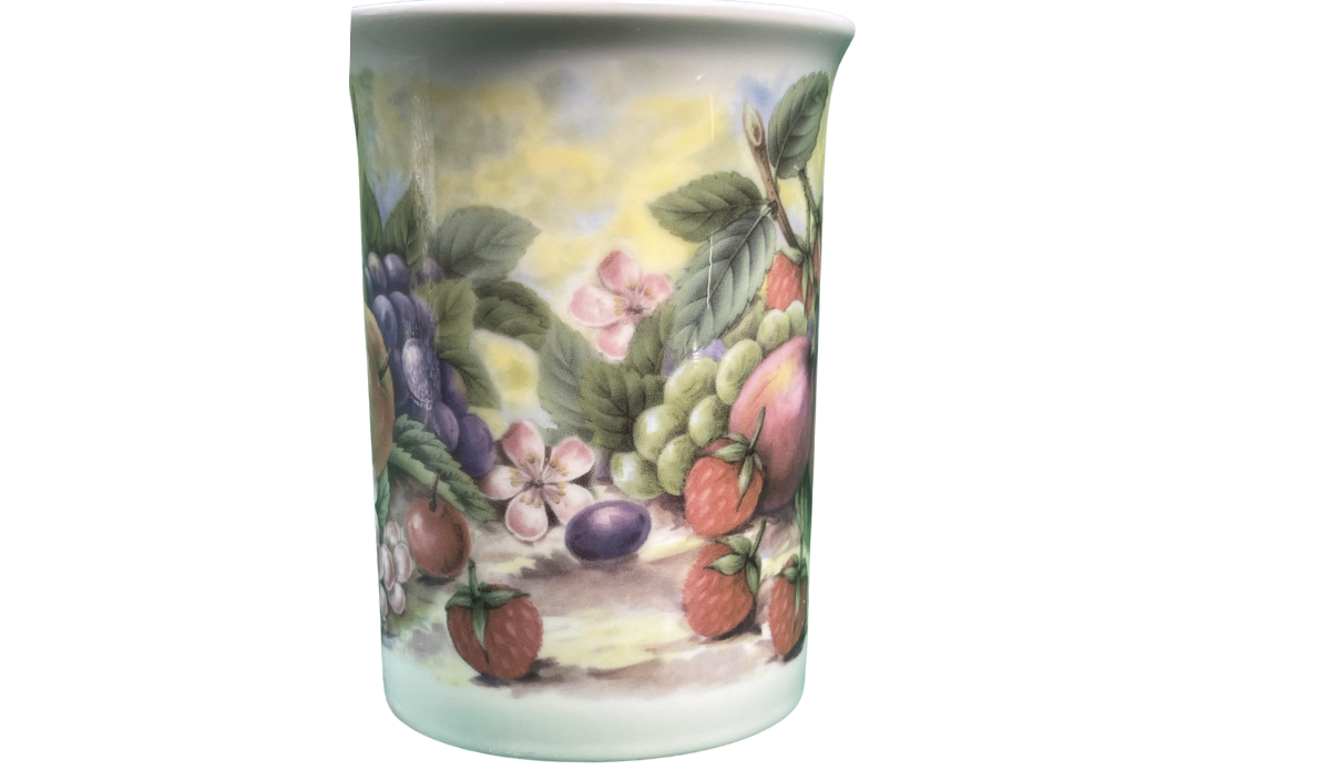 Middle view of the Churchill fruit mug with grapes, strawberries, leaves, and pink flowers