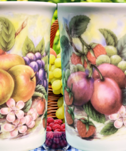 Churchill Fruit and Flower Mug displayed in an outdoor fruit and garden picnic setting