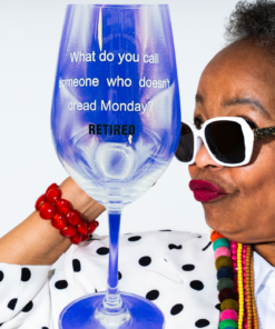 Retired Monday Funny Wine Glass displayed with stylish retired woman