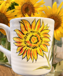 Pier 1 Sunflower Fields Mug styled in kitchen with fresh sunflowers and warm decor