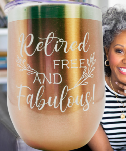 Retired Free And Fabulous rose gold wine tumbler displayed with smiling retiree