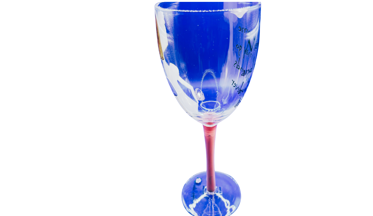 Girlfriends Last Forever Wine Glass side view with clear bowl, reddish-pink stem, and partial friendship quote