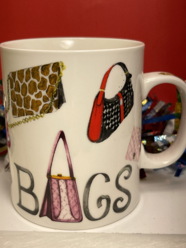 All around this unique handbags coffee cup mug will definitely will please the purse lover. It has handbags of all styles and the word BAGS. Additionally, the details of this Coffee Cup with Multicolor Handbags are great. The handle looks like a gold chain purse strap handle.