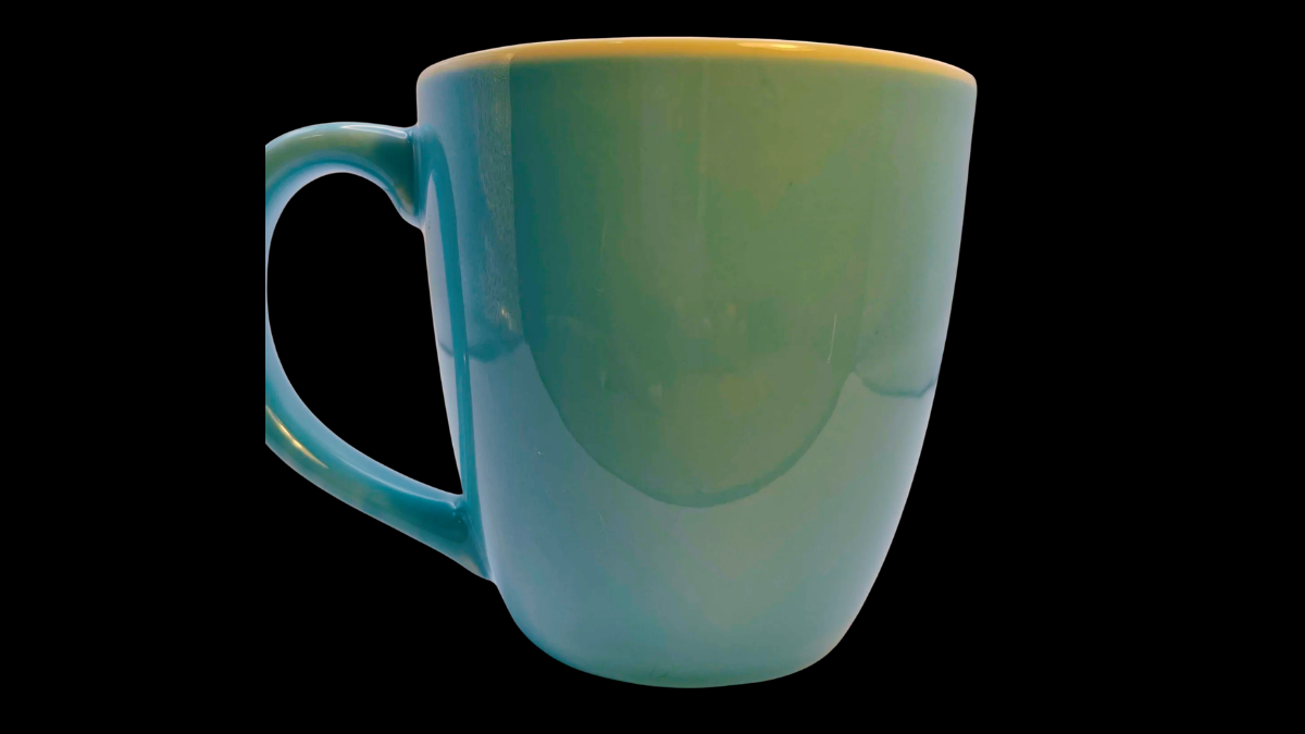 Stay In Bed Extra Large Mug lifestyle image on bed with cozy background