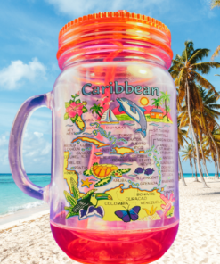 pink caribbean islands mason jar tumbler on tropical beach with palm trees and ocean background