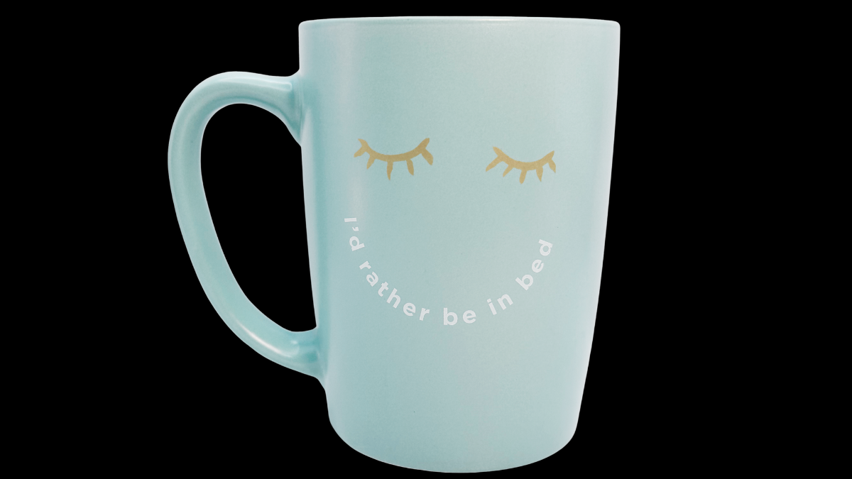 I’d Rather Be In Bed Mug front view teal ceramic with gold eyelash detail