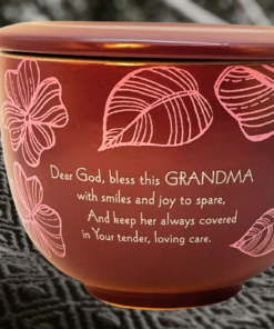 Abbey Press prayer for grandma mug with lid on wooden table with cookies in cozy kitchen setting