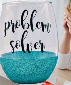 Problem Solver Stemless Glass lifestyle scene beside stressed woman at desk with paperwork and receipts
