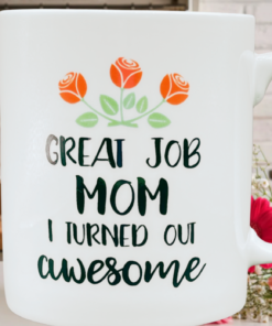 great job mom mug styled in kitchen with flowers and countertop background