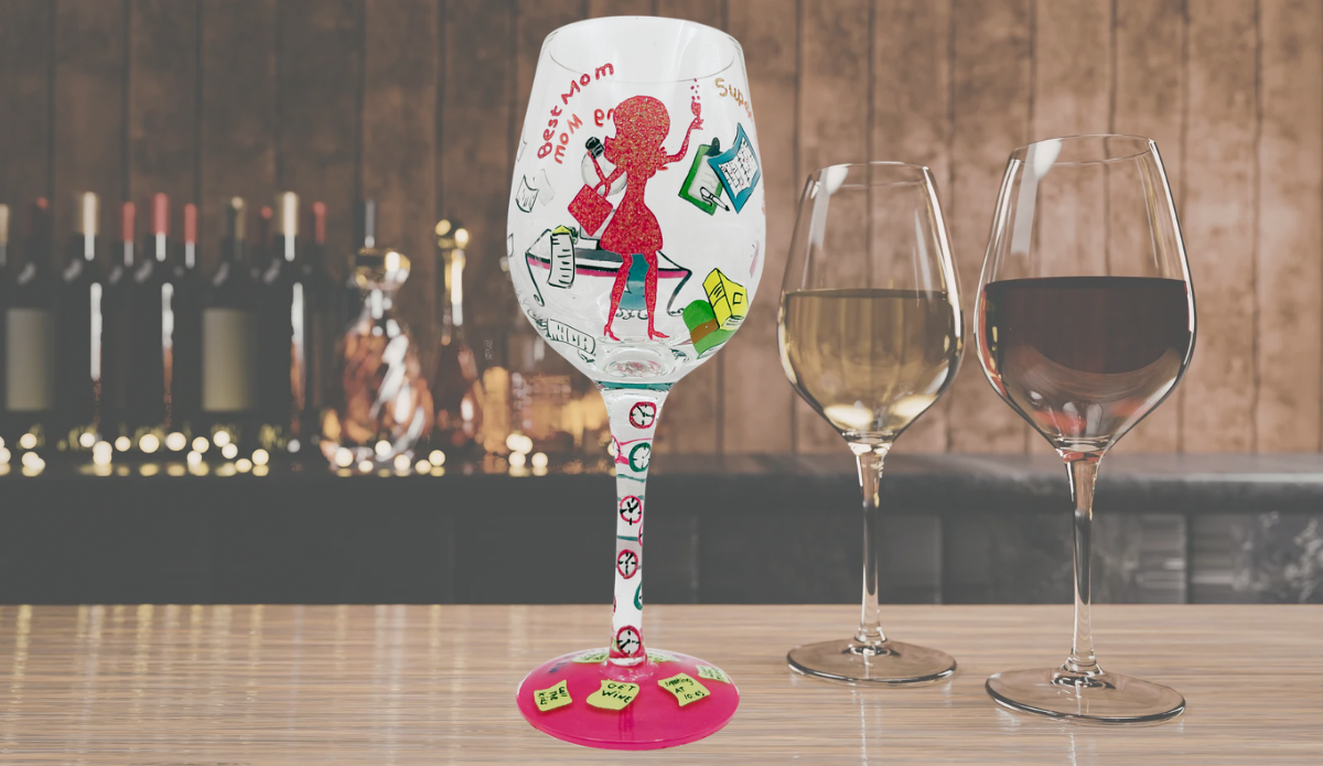 olita Working Mom Wine Glass displayed on bar with wine glasses highlighting lifestyle use