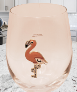 blinged out flamingo stemless wine glass in modern kitchen setting with jeweled flamingo detail and bright countertop
