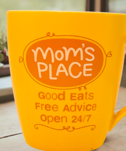 Hallmark Mom’s Place Coffee Mug styled with cozy kitchen décor and breakfast setting
