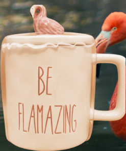 be flamazing flamingo mug lifestyle scene with real flamingo in background tropical setting