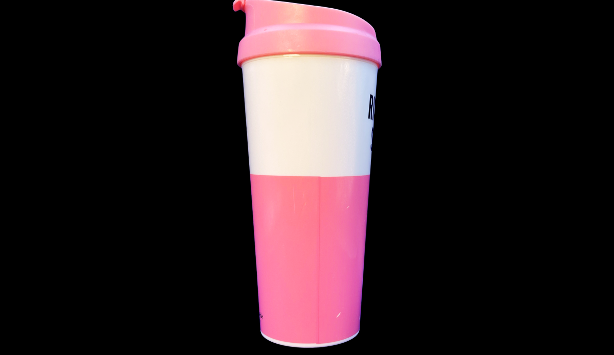 Kate Spade Rise and Shine Pink Tumbler angled side view showing shape and lid
