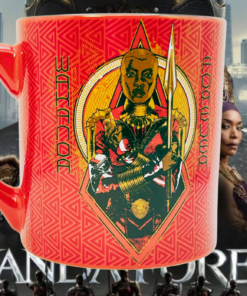 Marvel Black Panther Okoye Wakanda Forever mug displayed with Wakandan movie background