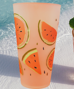 : Watermelon Jumbo Acrylic Tumbler beside a fresh watermelon drink on sandy beach