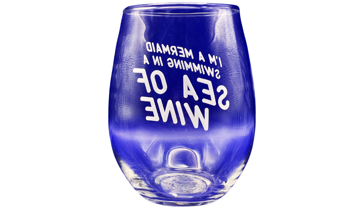 Back view of clear Mermaid Sea Of Wine Stemless Wine Glass showing reversed white lettering